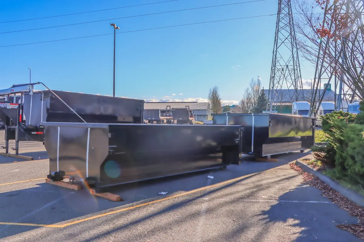 Roll-off dumpster ready for waste disposal at job site for Cleanout Dumpster Rental in Enfield
